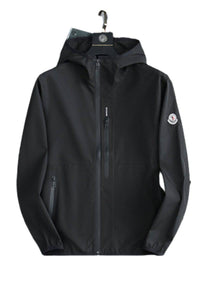 Men's Jacket 58 by 24HEARTZ, featuring a stylish design and durable fabric in a casual outdoor setting.