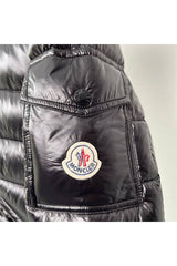 Men's 24HEARTZ jacket, featuring a sleek design and modern fit, displayed in a casual outdoor setting.