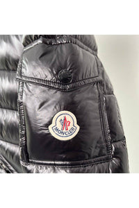 Men's 24HEARTZ jacket, featuring a sleek design and modern fit, displayed in a casual outdoor setting.