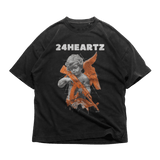 24Heartz angel AK47 t-shirt featuring a graphic design with an angel and AK47 on a classic black tee.