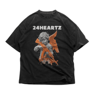 24Heartz angel AK47 t-shirt featuring a graphic design with an angel and AK47 on a classic black tee.