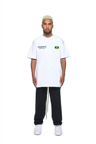 24Heartz Jamaica badge T-shirt featuring a vibrant design on a classic tee.