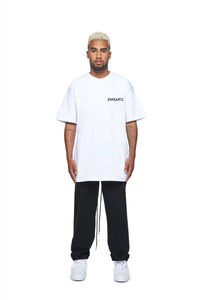 24Heartz "Make Money Not Friends" T-Shirt featuring bold text design on a casual shirt in a relaxed fit.