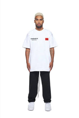 24Heartz t-shirt featuring a Morocco badge design in vibrant colors on a casual tee.