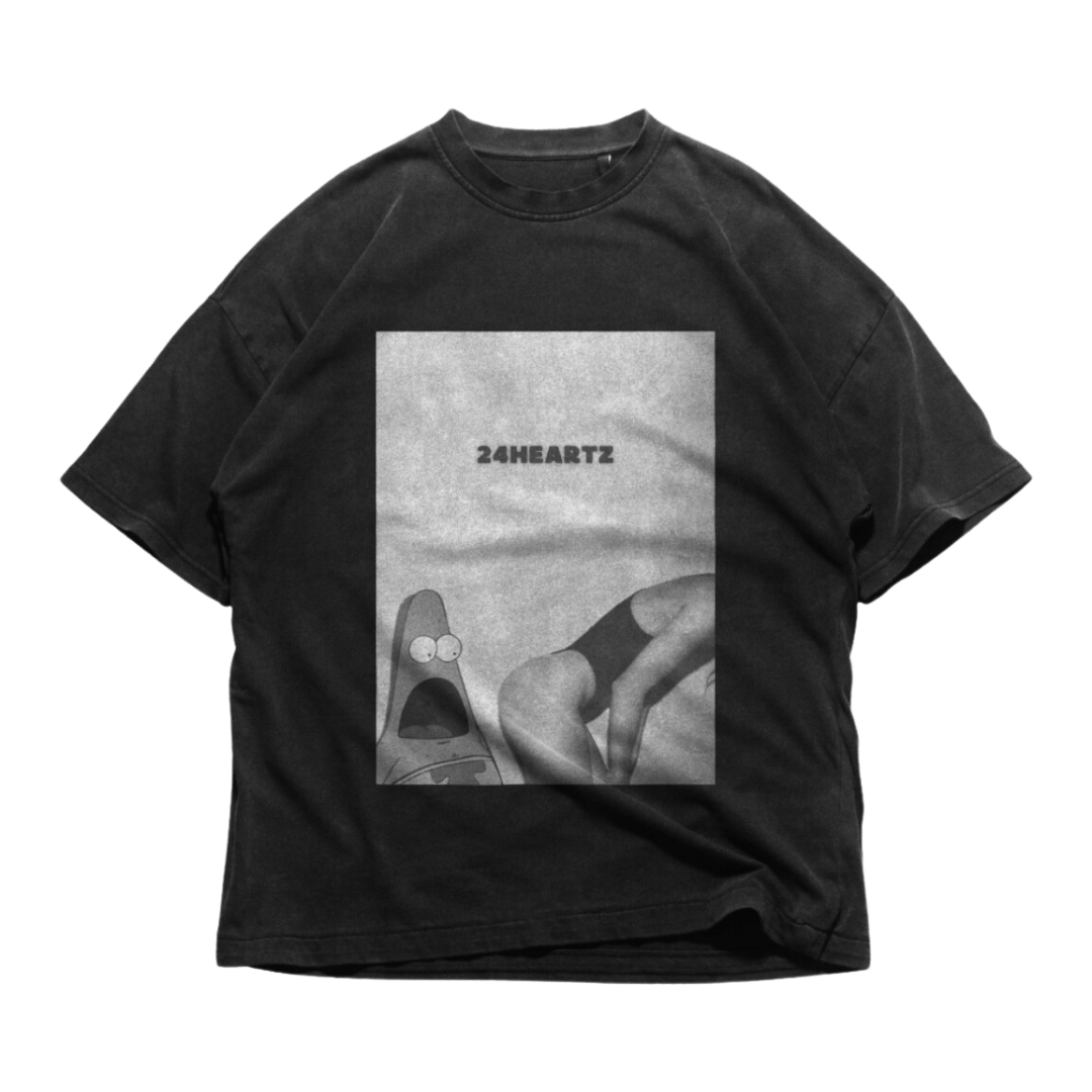 24Heartz T-Shirt featuring a vibrant Patrick design, showcasing a comfortable fit and stylish graphic print.