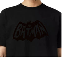 Black 24HEARTZ T-Shirt 1572 displayed on a hanger, featuring a crew neck and short sleeves.