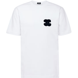 Colorful Its24heartz T-shirts displayed in a casual arrangement, showcasing fabric texture and design details.
