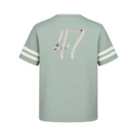Its24heartz T-Shirt featuring a casual design, displayed on a wooden background with vibrant colors.