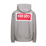 Black Its24heartz hoodie with a front pocket and drawstring hood, featuring a relaxed fit and soft fabric.