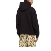 Its24heartz hoodie showcasing a cozy design with a front pocket and drawstring hood in a casual setting.