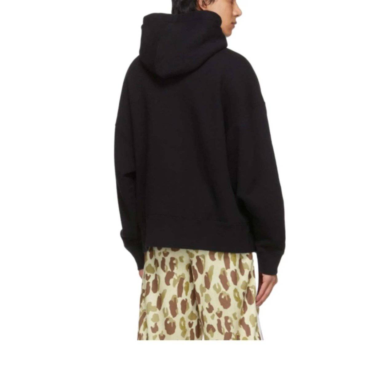 Its24heartz hoodie showcasing a cozy design with a front pocket and drawstring hood in a casual setting.
