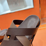 24HEARTZ Kazimir Sandal showing stylish open-toe design with leather straps and flat sole, perfect for casual summer wear.