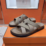 24HEARTZ Kazimir Sandal featuring a stylish open-toe design with braided straps and a comfortable flat sole.