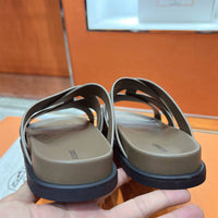 Kazimir sandal by 24HEARTZ featuring leather straps and a cushioned sole for casual summer wear.