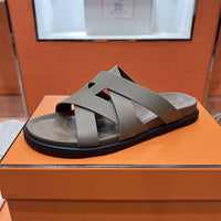 24HEARTZ Kazimir Sandal featuring leather straps and a comfortable flat sole, ideal for casual summer wear.
