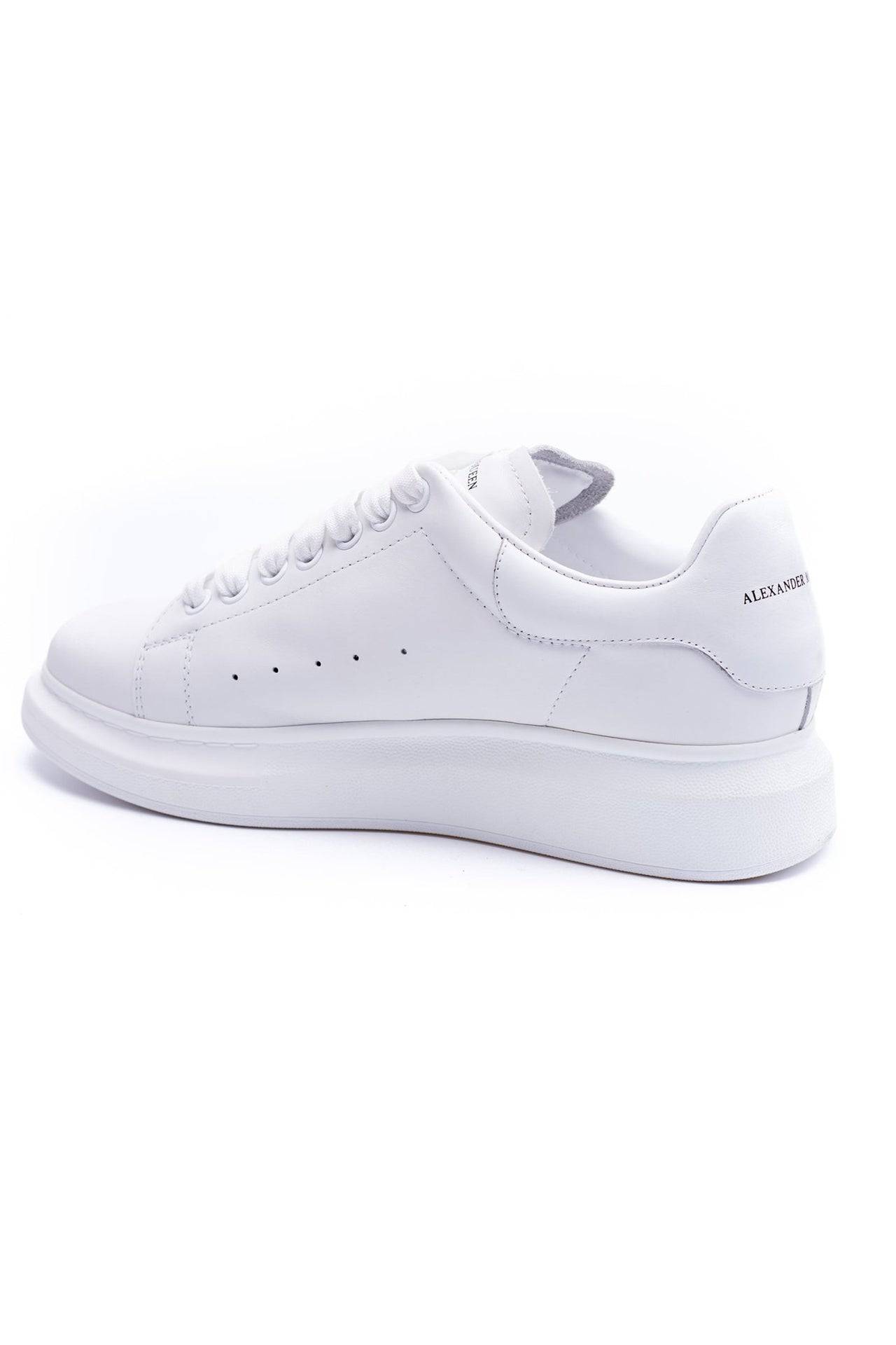 Oversized sneaker by 24HEARTZ featuring a chunky design, soft fabric, and bold color scheme on a white background.