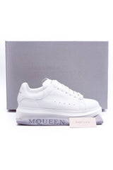 24HEARTZ oversized sneaker in white with chunky sole and lace-up design, showcasing a modern casual style.